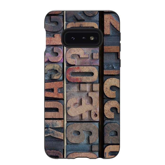 Galaxy S10e StrongFit Old Wooden Print Blocks by Andrea Haase